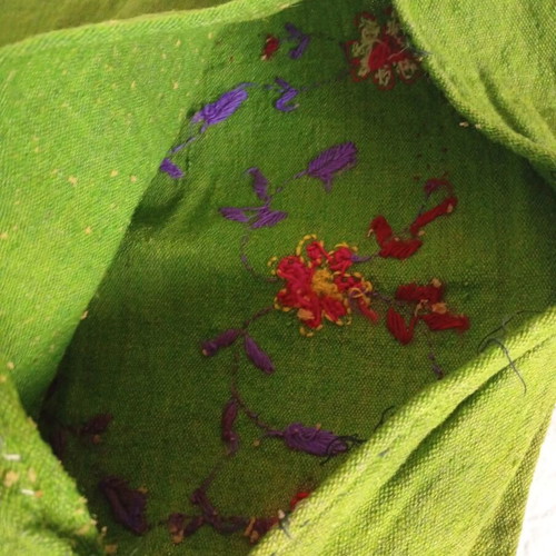 Embroidered green pillowcase used with details