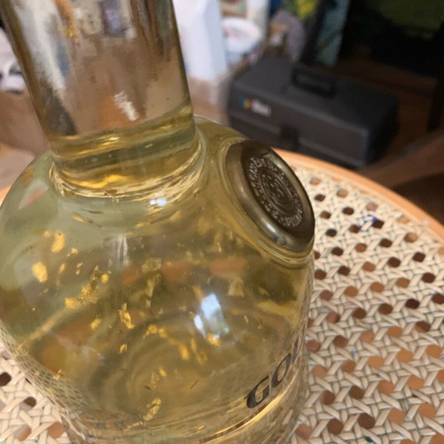 Goldschlager bottle like new with gold leaf bits collectible