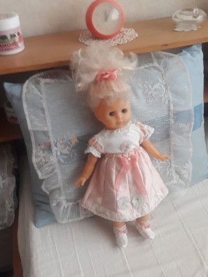 Vintage doll with handmade clothes like new