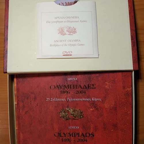 Athens Olympiads 1896-2004 album new with 25 collector telephone cards and 2 DVDs