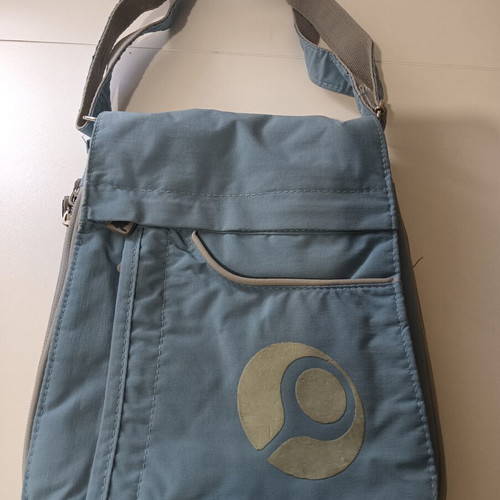 Fabric crossbody bag used, turquoise color