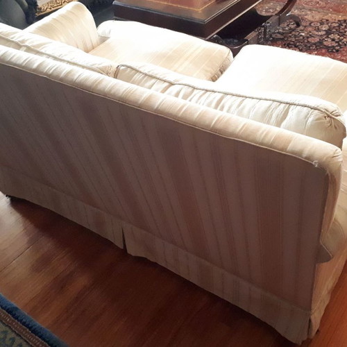 Two-seater sofa used 1.40x0.85 m with silk-cotton filling