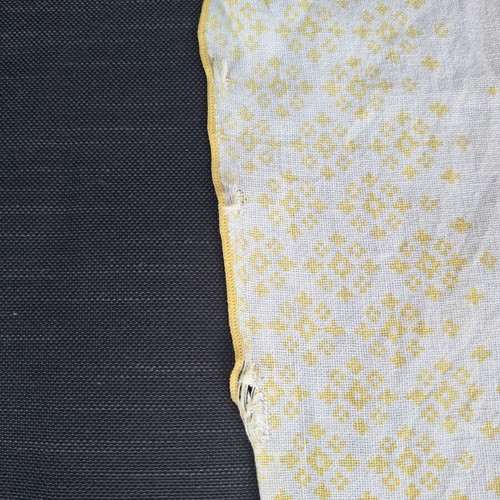 Small tablecloth with candles and fruit used