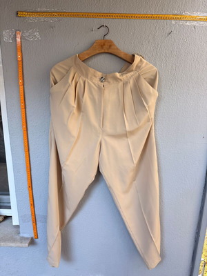 Women's high-waisted pants with pleats used, beige