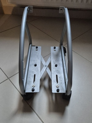 Adjustable wheeled computer tower stand