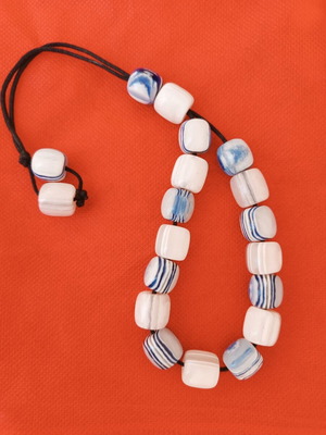Worry beads with white and blue shiny beads