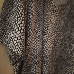 Short-sleeve blouse with shoulder pads like new, size L