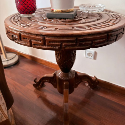 Handmade wooden coffee table with carved surface