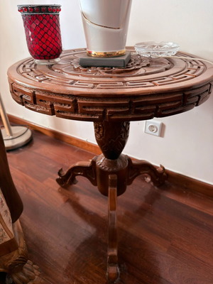 Handmade wooden coffee table with carved surface