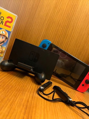 Nintendo Switch σε άριστη κατάσταση με τσαντάκι και παιχνίδια Smurfs 2, SuperMario Maker 2