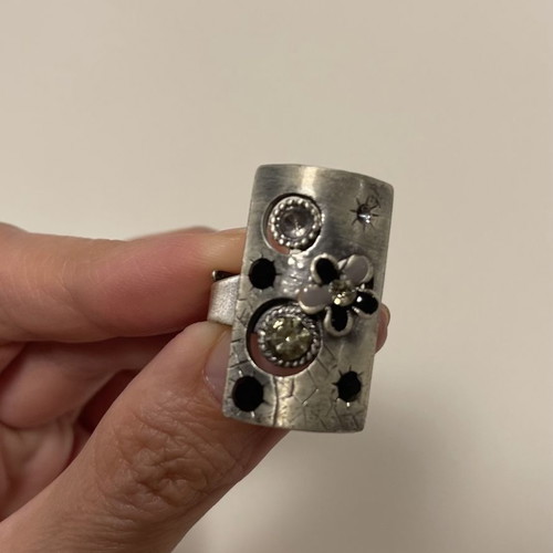 Set of 7 rings used with adjustable clasp