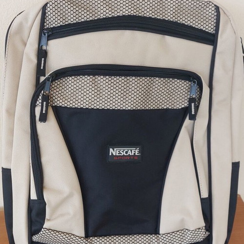 Backpack new, beige and black, durable material