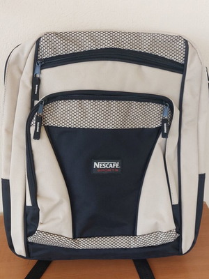 Backpack new, beige and black, durable material