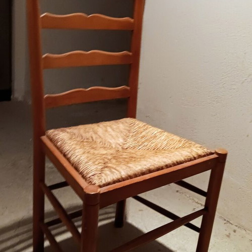 Wooden chair used with cane seat and embossed wood