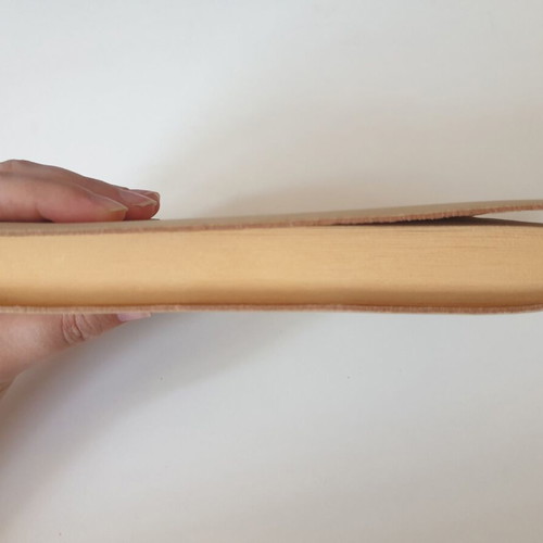 Handmade notebook with leather cover and metal airplane