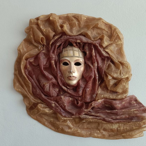 Handmade 3D wall decoration with theatrical mask used