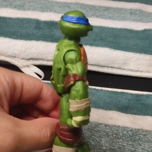 Leonardo Teenage Mutant Ninja Turtle figure used, missing shell