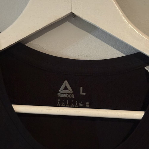 Reebok women's t-shirt like new, black and white, size L