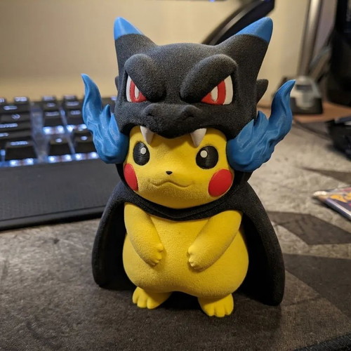 Pikachu Mega Charizard X Poncho collectible Pokémon figure