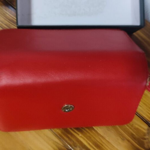 Verde red leather wallet, worn front and broken zipper