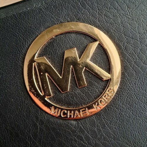 Michael Kors wallet used, black with gold monogram