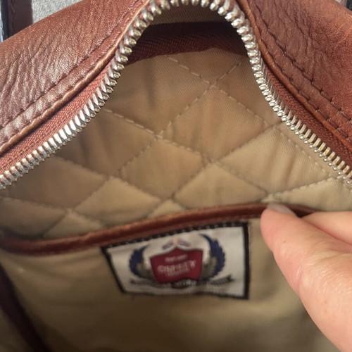 Osprey leather backpack used, brown ladies bag