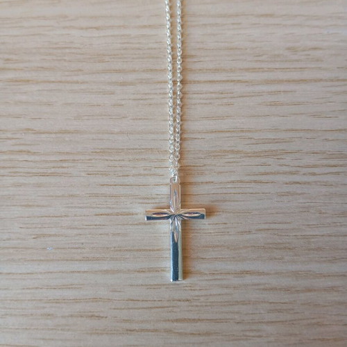 Steel cross like new, silver color