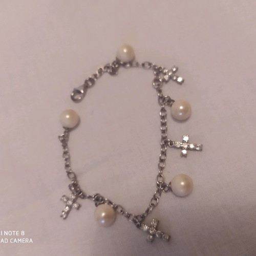 Bracelet with hanging crosses and pearls like new