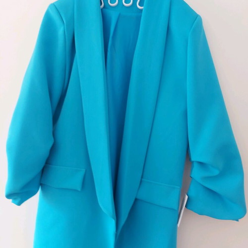 Blue jacket new with unique sleeve and tags