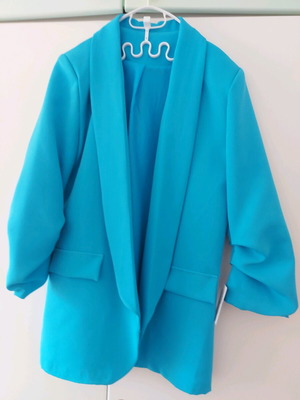 Blue jacket new with unique sleeve and tags