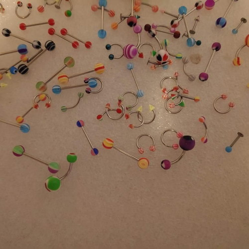 Piercing earrings set like new, 100 pieces, various designs and colors