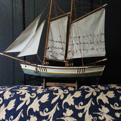 Decorative wooden ship and large handcrafted wooden boat