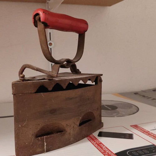 Antique charcoal iron used, 100 years old