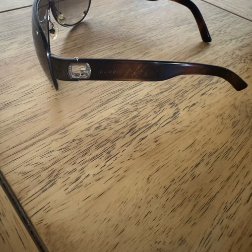Gucci women's sunglasses used with brown lenses