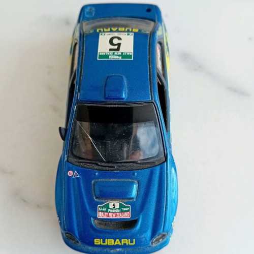 Subaru Impreza WRC toy car used, metal and plastic