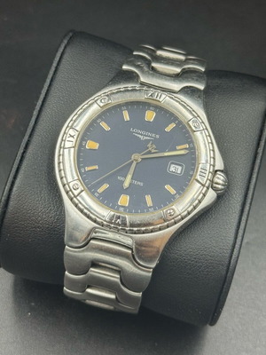 Longines Golden Wings 100m used men's silver watch