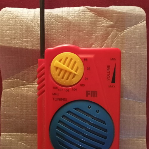 Children's FM radio like new, red with belt clip