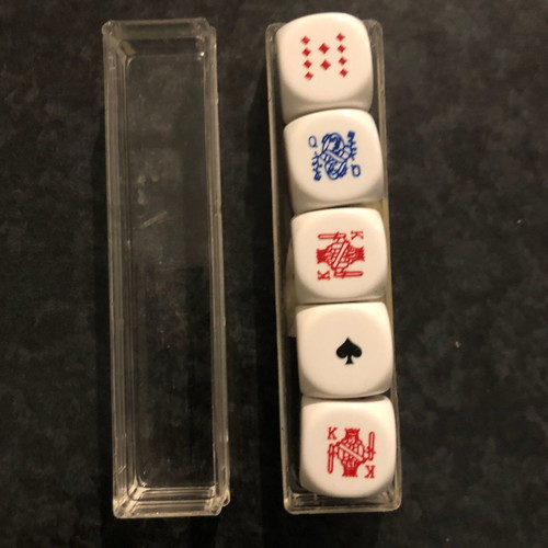 Dice set with playing card symbols used, with box