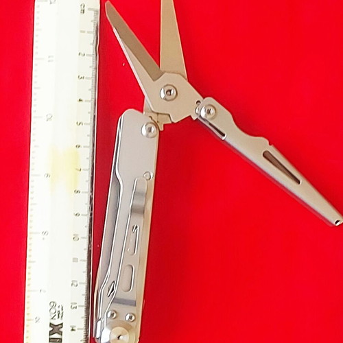 Multitool new with large scissors, knife, and double-tip screwdriver