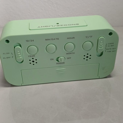 Digital tabletop clock used with alarm