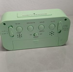 Digital tabletop clock used with alarm