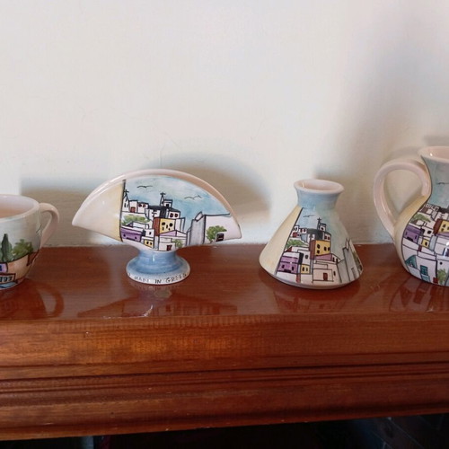 Handmade clay decorations like new, jug, vase, cup, napkin holder