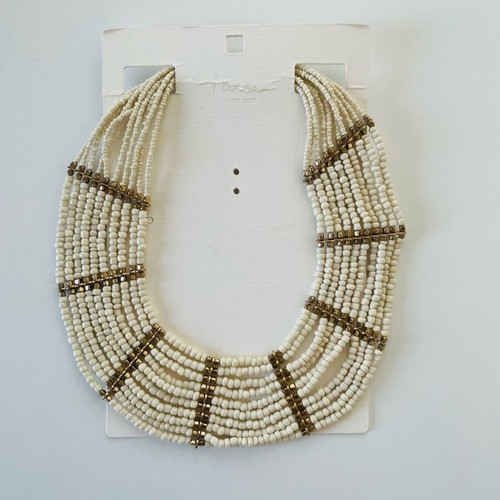 Wide necklace like new with beige and gold beads and metal details