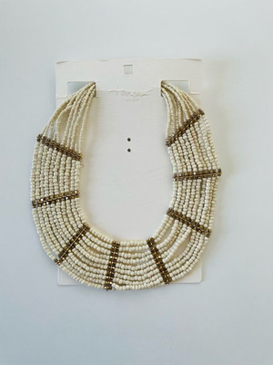 Wide necklace like new with beige and gold beads and metal details