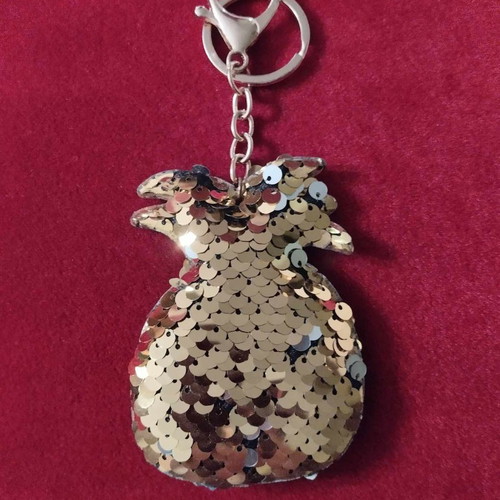 Pineapple keychain with sequins like new, gold and silver