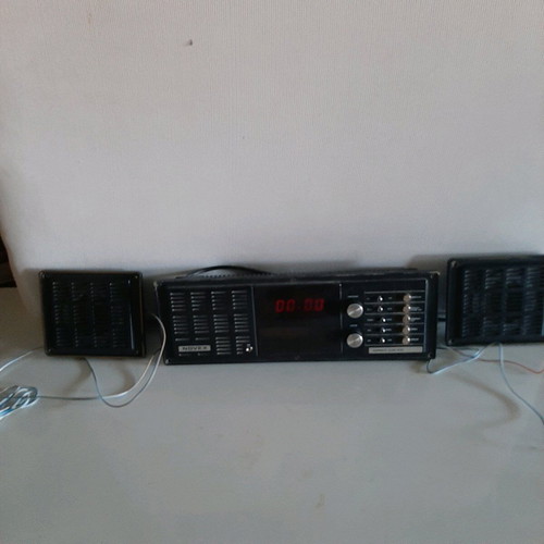 Bedside radio clock used, 1970s with speakers