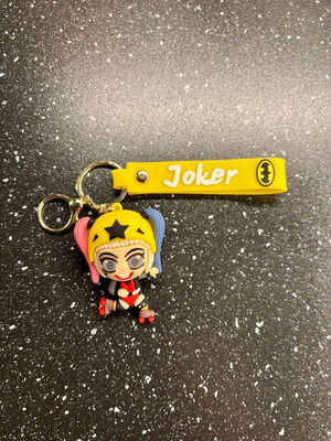 Harlequin keychain or bag charm with roller skates like new