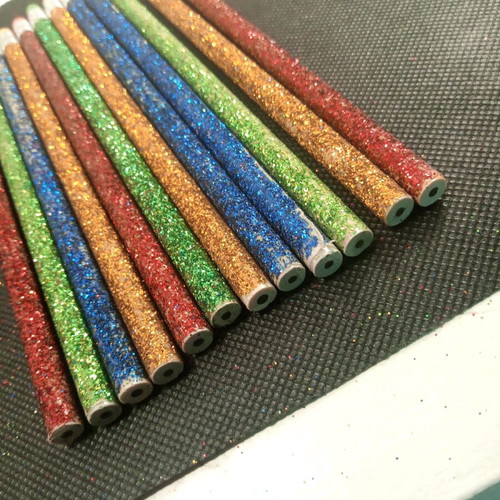 Pencils new with glitter and eraser on the back