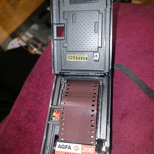 Mini Cam 35mm camera used with built-in flash