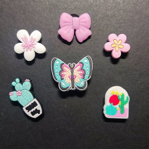 Crocs charms set brand new, pink and turquoise
